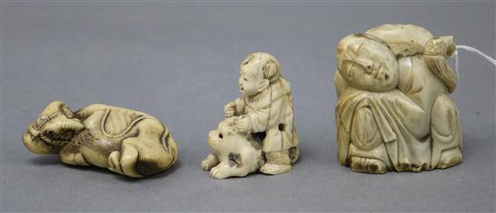 A Japanese staghorn buffalo netsuke and two others